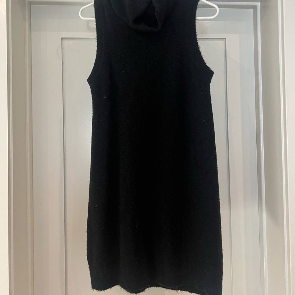 Black turtle neck/ sleeveless mini dress. Size M, lightly used